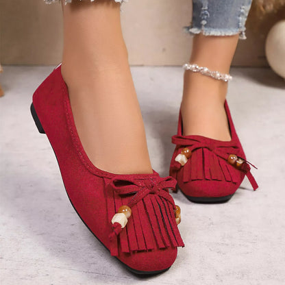 Suede Fringe Slip-Ons -