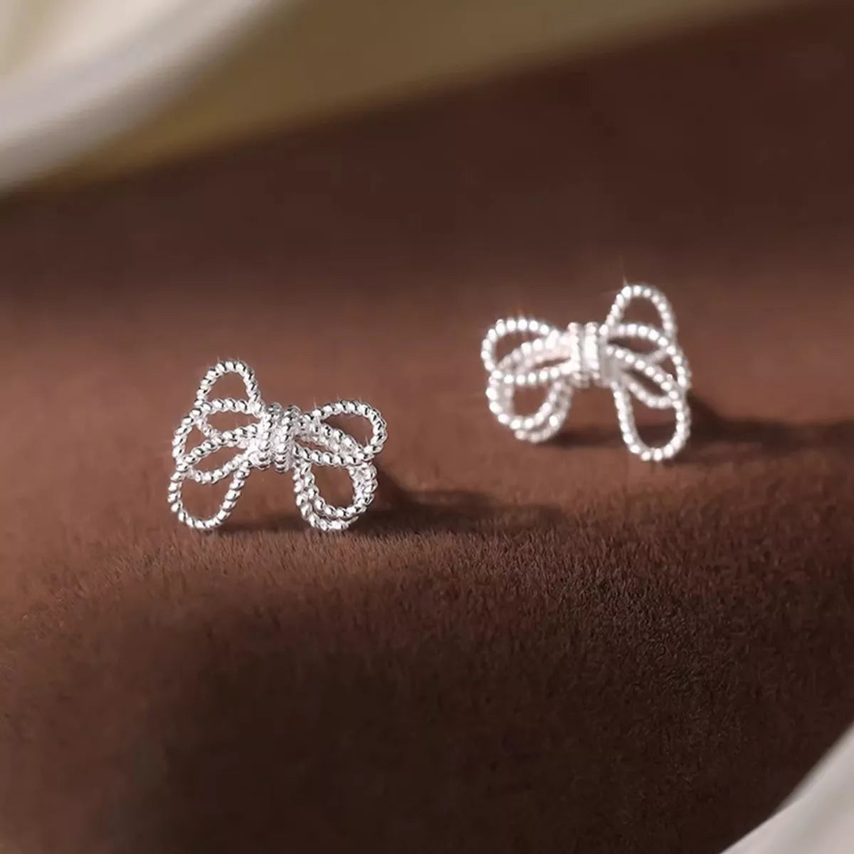 Sterling Silver Bow Knot Stud Earrings -