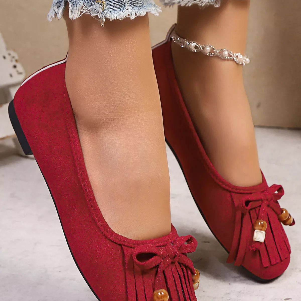 Suede Fringe Slip-Ons -