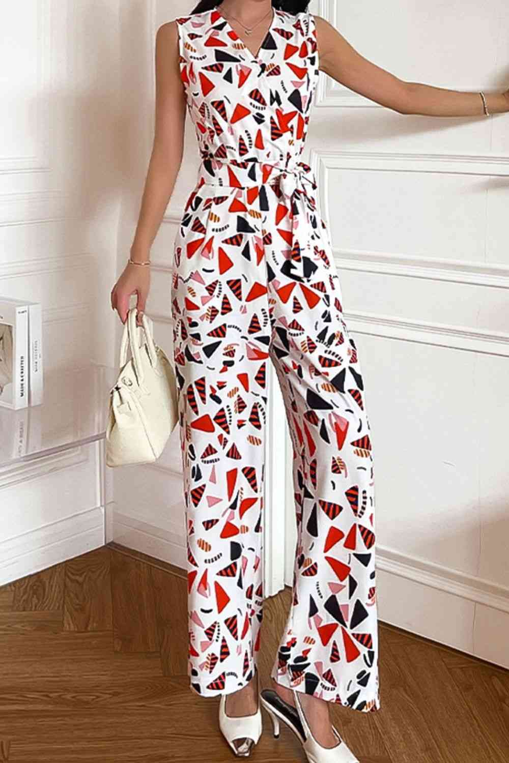 Printed Surplice Neck Sleeveless Jumpsuit | AdoreStarr